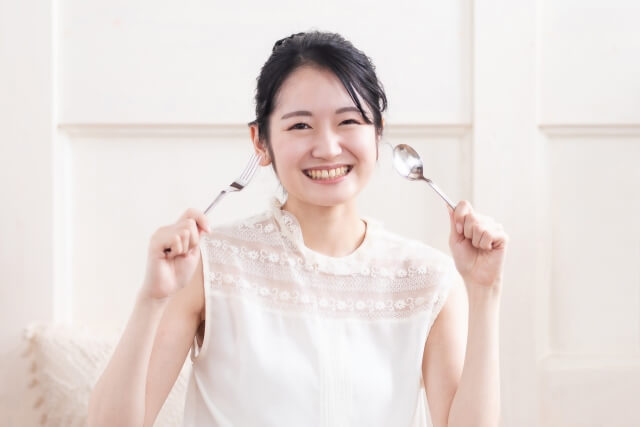 お米を完食した女性